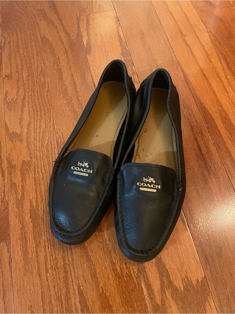 Coach Black Leather Slip-On Loafers with Gold Logo